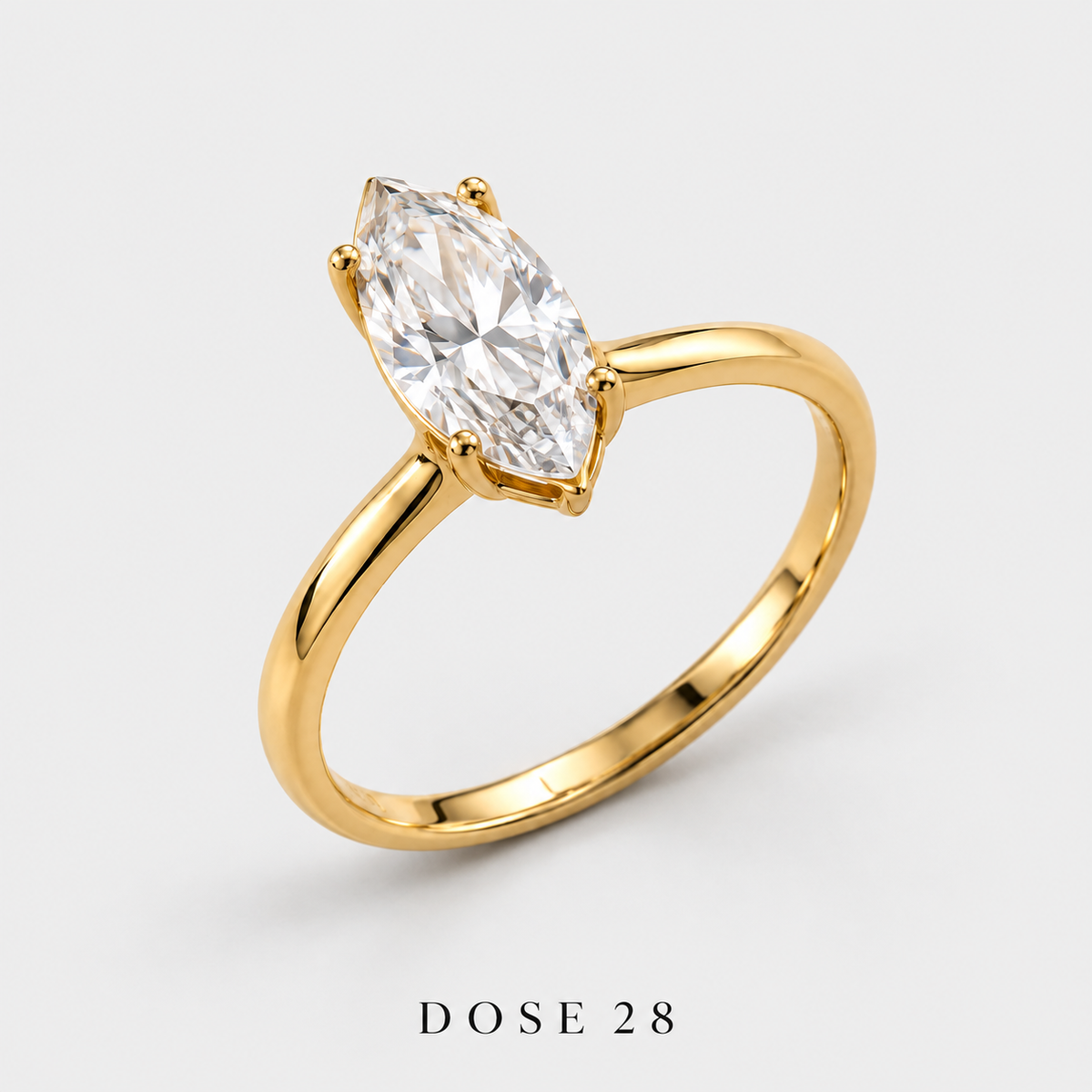 Gold-Tone Marquise Solitaire Ring  خاتم سوليتير ماركيز بلون ذهبي