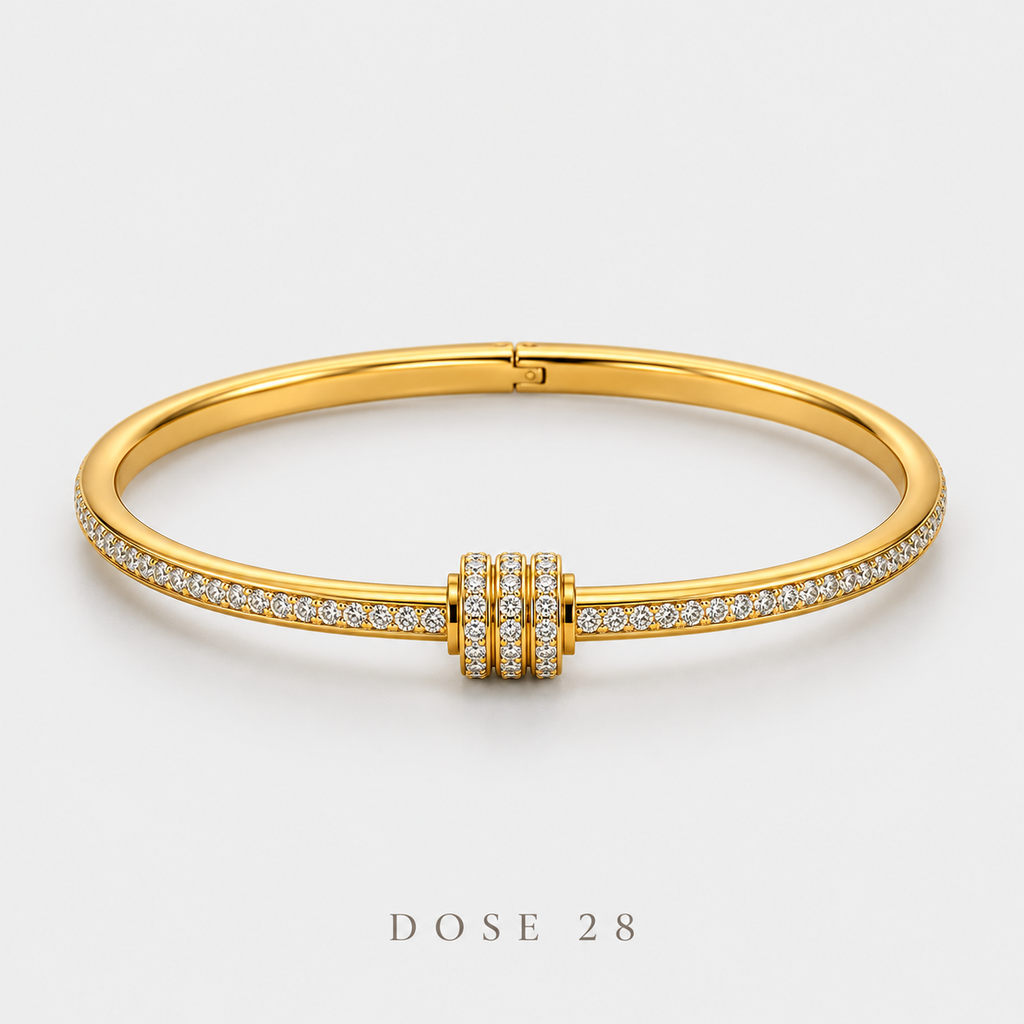 Triple Ring Gold-Tone Bangle أسوارة بلون ذهبي ويا ثلاث حلقات