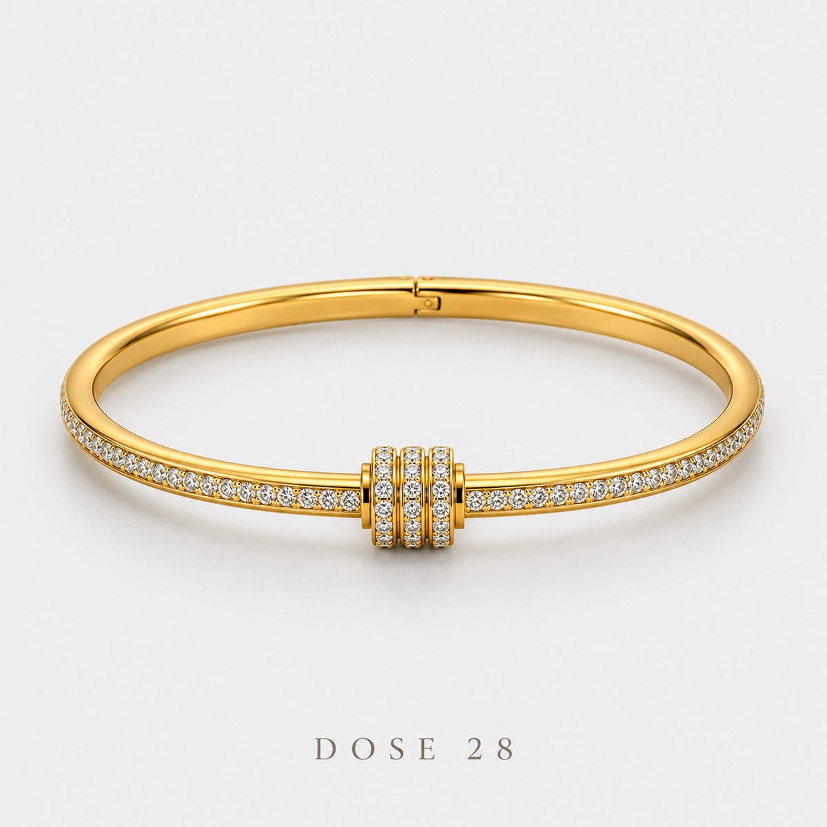 Triple Ring Gold-Tone Bangle أسوارة بلون ذهبي ويا ثلاث حلقات