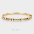 Gold-Tone X Sparkle Bangle  أسوارة إكس المرصّعة