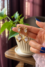 Double Oval Sparkle Drop Earrings تراجي البريق المزدوج