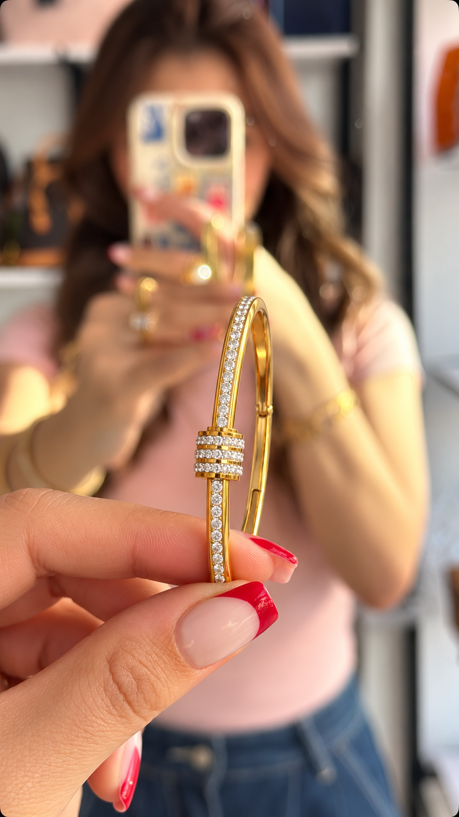 Triple Ring Gold-Tone Bangle أسوارة بلون ذهبي ويا ثلاث حلقات