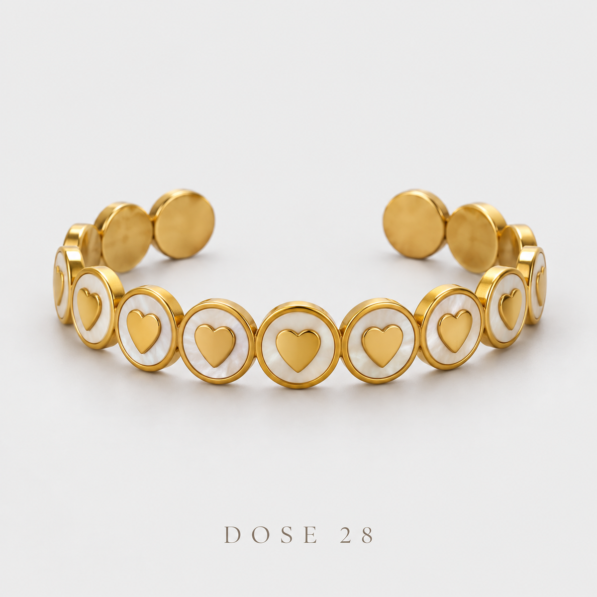 Gold-Tone Heart Medallion Cuff   أسوارة القلوب باللون الذهبي والأبيض اللؤلؤي