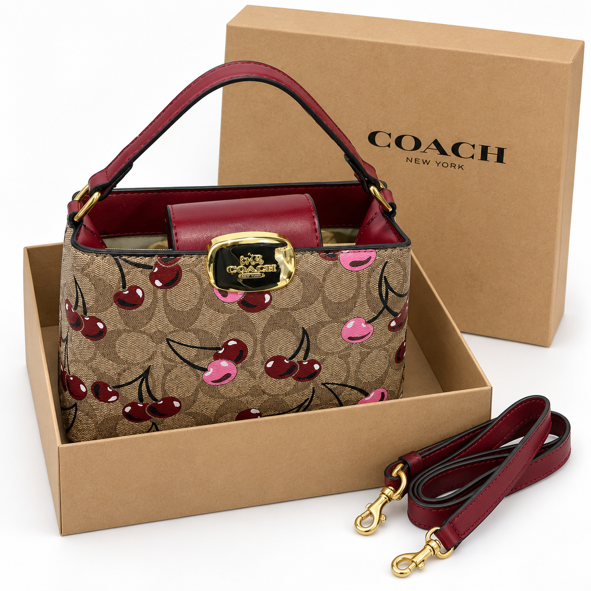 شنطة كوتش مونوغرام بنقشة الكرز – بني وعنابي Coach Cherry Print Top-Handle Bag – Brown &amp; Burgundy