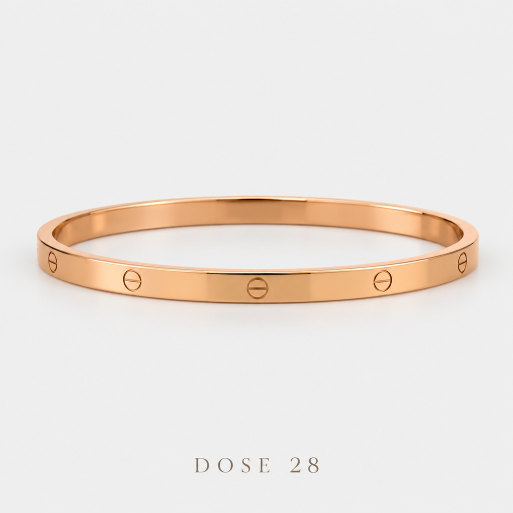 Rose Gold-Tone Screw Motif Bangle  أسوارة النقش الدائري بلون روز گولد