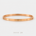 Rose Gold-Tone Screw Motif Bangle  أسوارة النقش الدائري بلون روز گولد