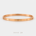 Rose Gold-Tone Screw Motif Bangle  أسوارة النقش الدائري بلون روز گولد
