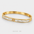 Pearly White Gold-Tone Bracelet  أسوارة بيضاء بلمعة لؤلؤية وإطار ذهبي
