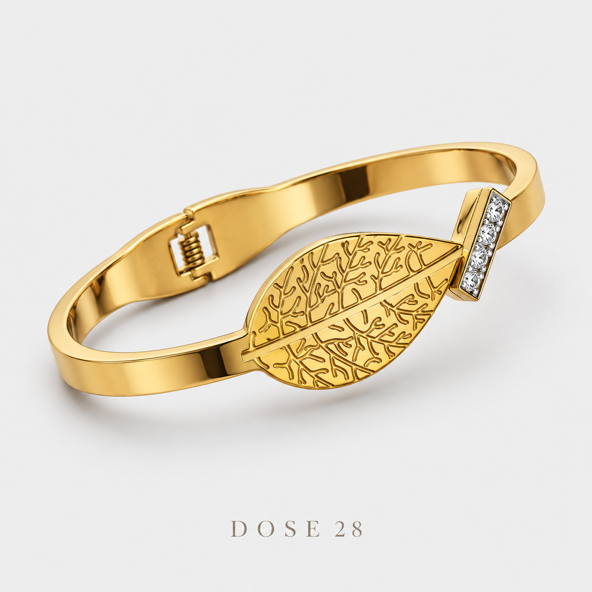 Gold-Tone Leaf Bracelet   أسوارة ورقة الشجر بلون ذهبي