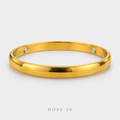 أسوارة كلاسيكية بلون ذهبي   Classic Gold-Tone Bangle