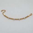Gold-Tone Curb Chain Bracelet with Four Clear Stones سوار بسلسلة مترابطة بلون ذهبي وأربعة أحجار شفافة