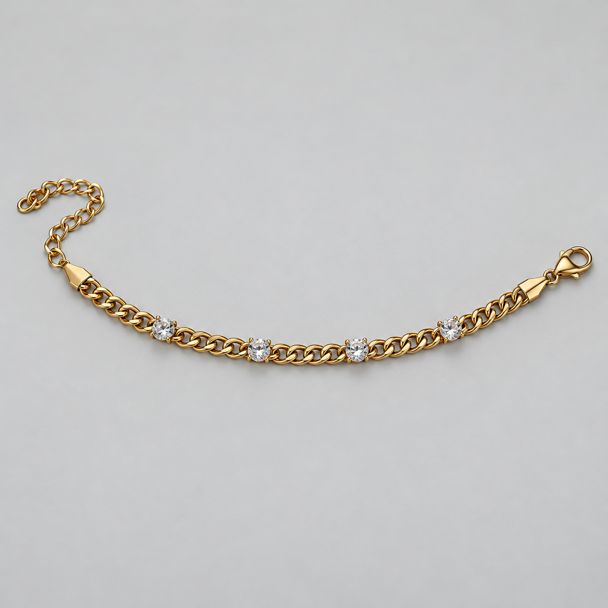 Gold-Tone Curb Chain Bracelet with Four Clear Stones سوار بسلسلة مترابطة بلون ذهبي وأربعة أحجار شفافة