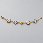 Gold-Tone Bracelet with Pearly White Floral Motifs سوار بلون ذهبي بزخارف زهرية بيضاء لؤلؤية