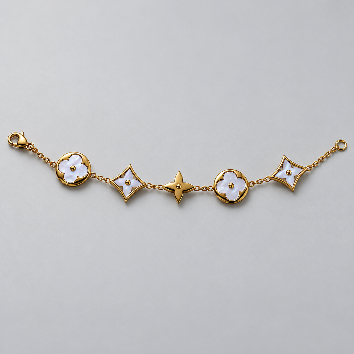Gold-Tone Bracelet with Pearly White Floral Motifs سوار بلون ذهبي بزخارف زهرية بيضاء لؤلؤية