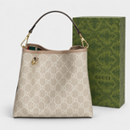 جنطة غوتشي GG ستايل باكيت — بيج وأبيض Gucci GG Bucket-Style Bag — Beige & White