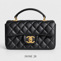جنطة شانيل سوداء مبطّنة بمقبض علوي Chanel Black Quilted Top-Handle Flap Bag