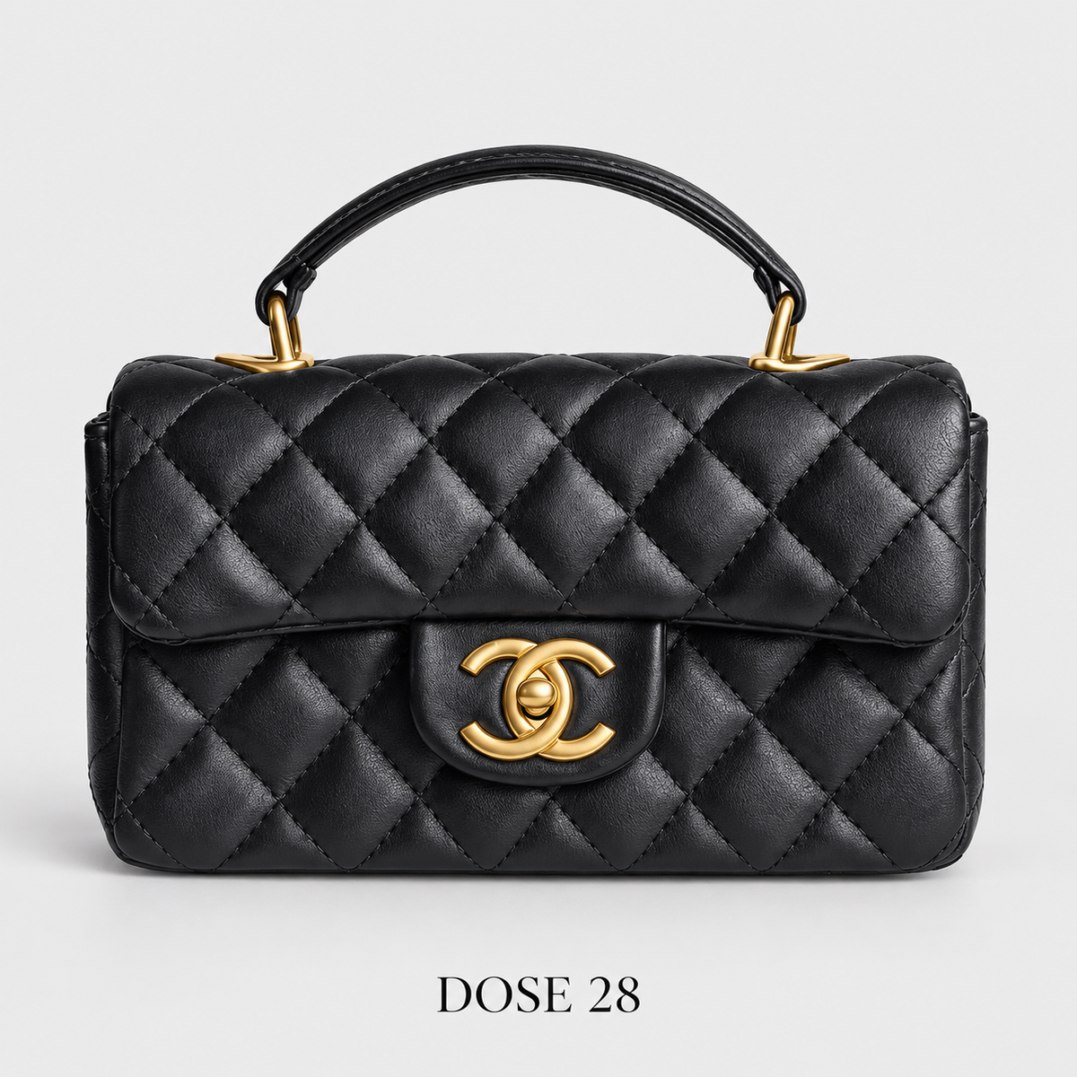 جنطة شانيل سوداء مبطّنة بمقبض علوي Chanel Black Quilted Top-Handle Flap Bag